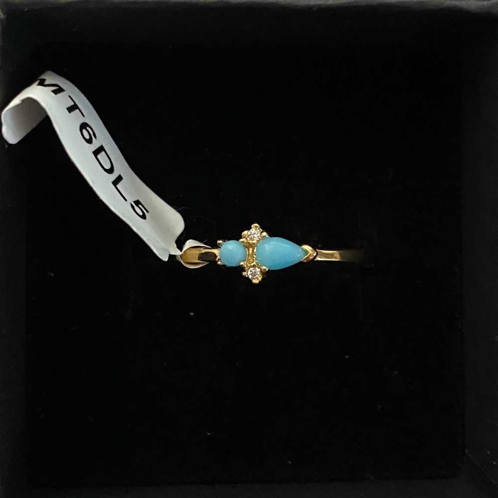 Charmed Aroma gold and turquoise ring.